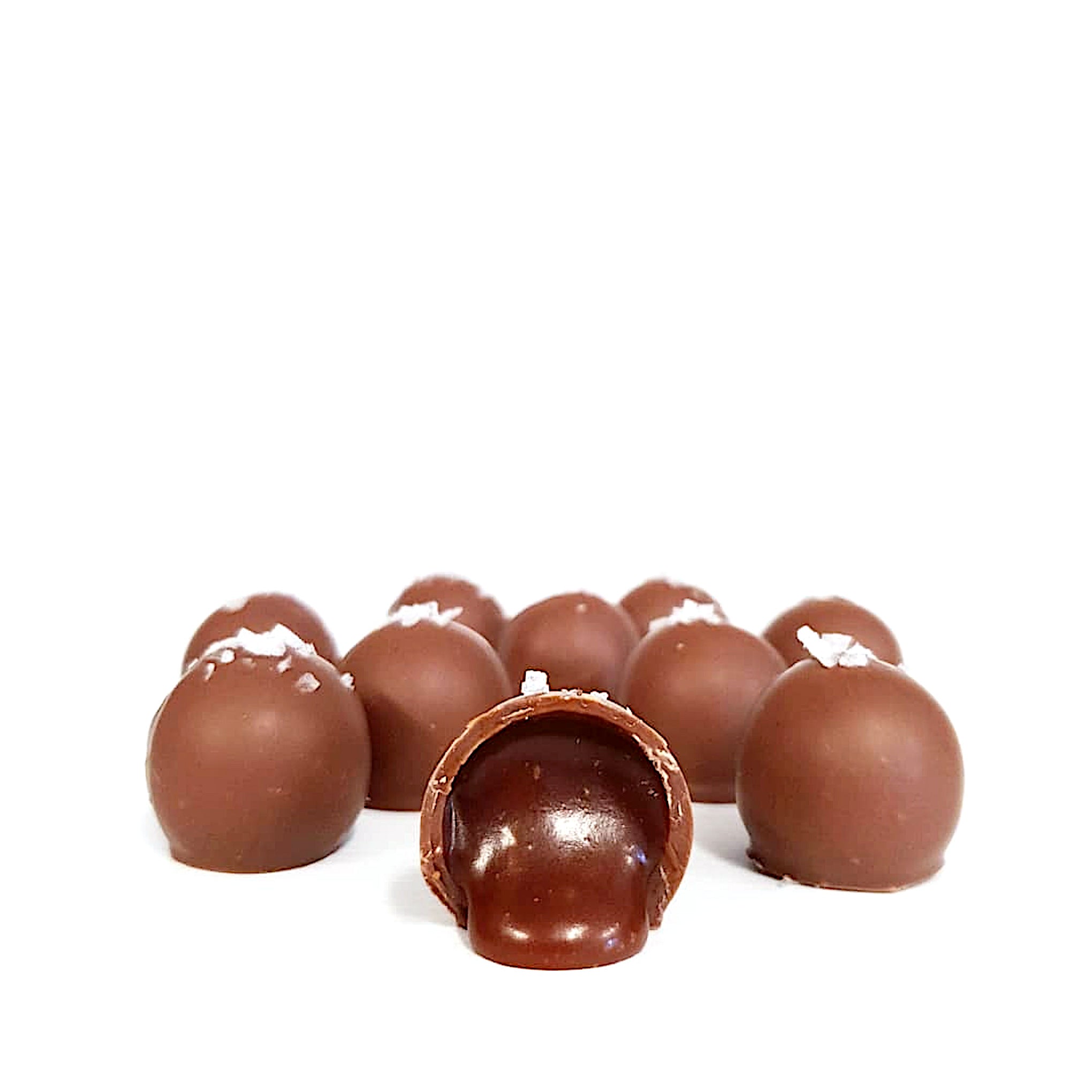 Handmade salted caramel truffles topped with sea salt flakes. Made by Woodstock Chocolate Co on the south coast of New South Wales in the picturesque town of Milton