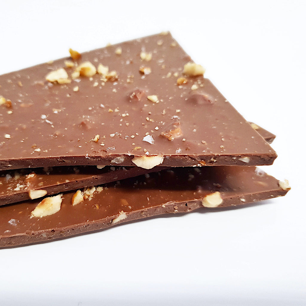Milk chocolate hazelnut and sea salt shards. Made using Callebaut Belgian couverture chocolate by Woodstock chocolate co - small South Coast NSW chocolate shop